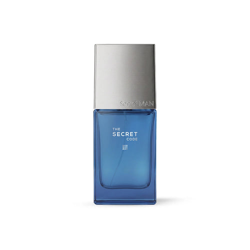 A rectangular blue glass perfume bottle with a metallic silver cap, labeled 'THE SECRET CODE III' and 'Secret MAN', centered on a plain white background.
