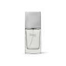 The Secret Code perfume by Secret Man in a clear glass bottle with a metallic silver cap on a white background.